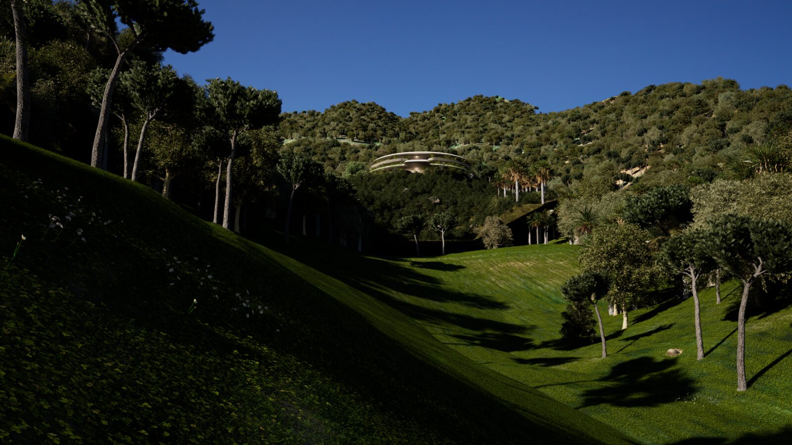 Valle verde con pinos y, en la ladera, la silueta circular de Villa Horizonte